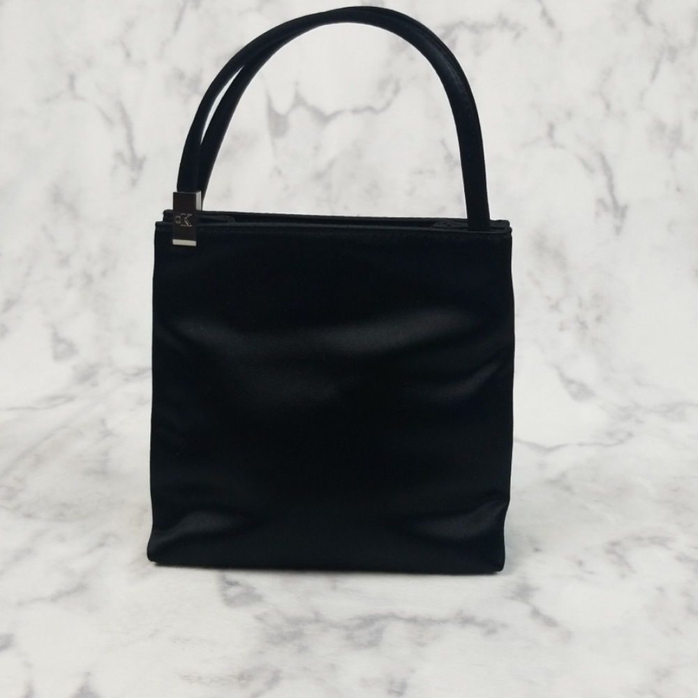 Calvin Klein mini black satin purse snap close